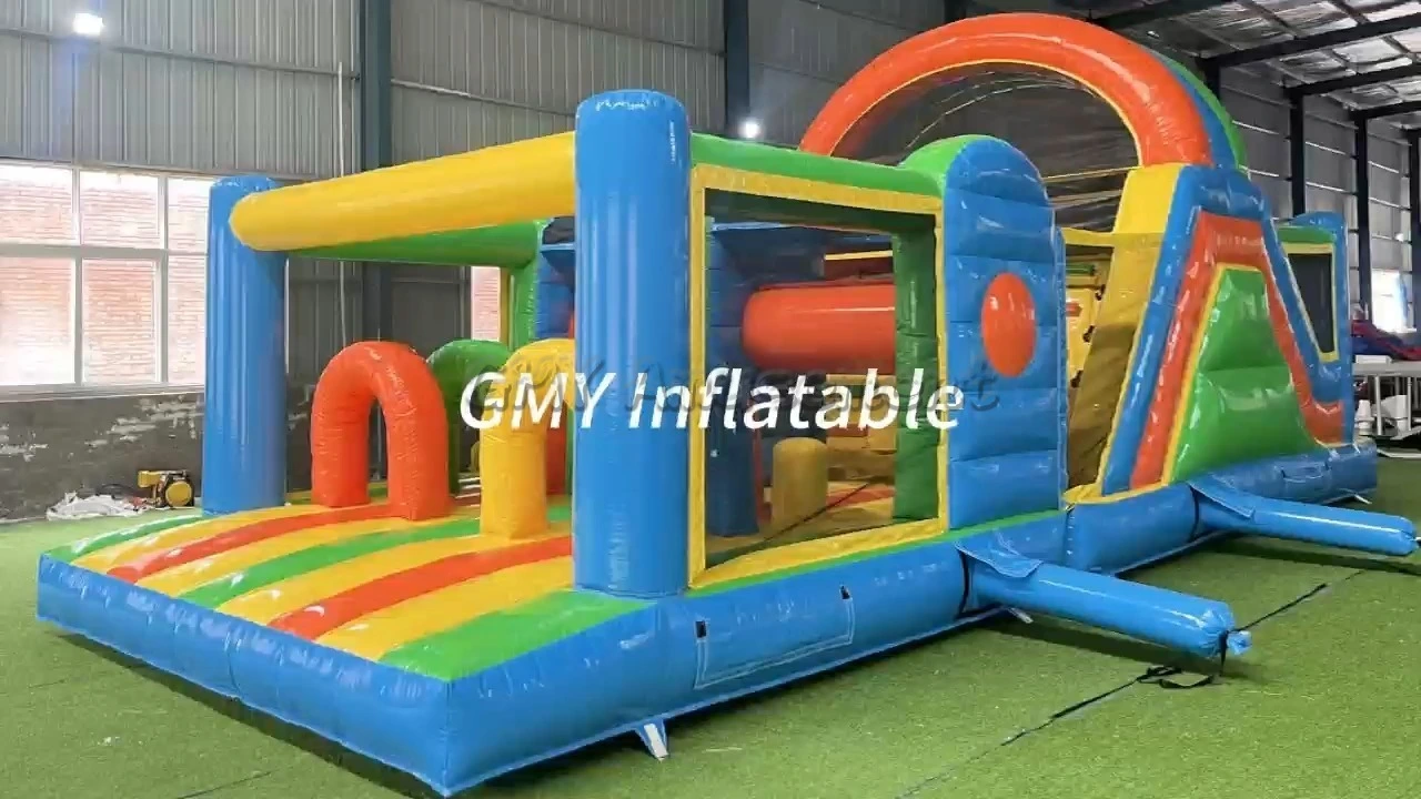 Aufblasbare Hüpfburg mit Hindernisparcours und Rutsche für Kinder zum Spielen im Freien (GMY Inflatables) 1
