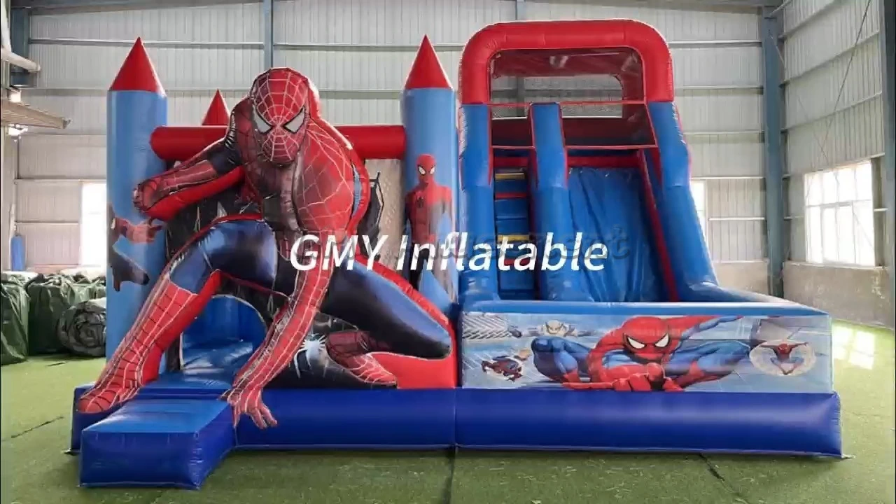 Location de matériel de fête : Château gonflable Spiderman pour enfants et adultes avec toboggan intégré (GMY Inflatables) 1