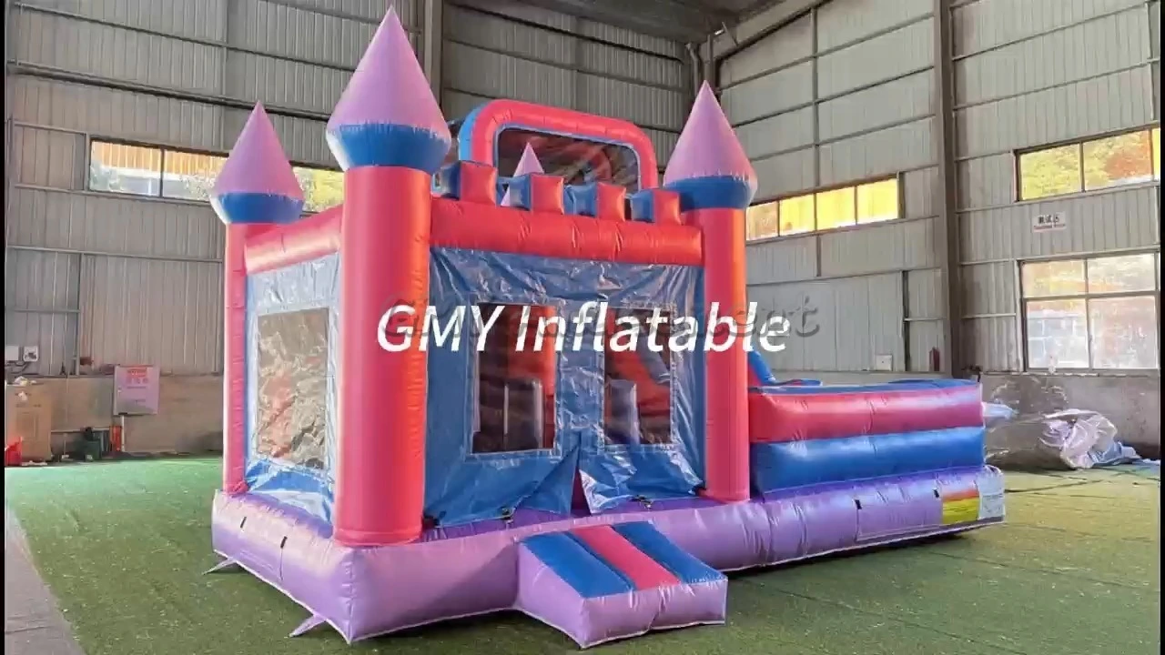 Château gonflable rose et violet avec toboggan intégré, GMY Inflatables 1