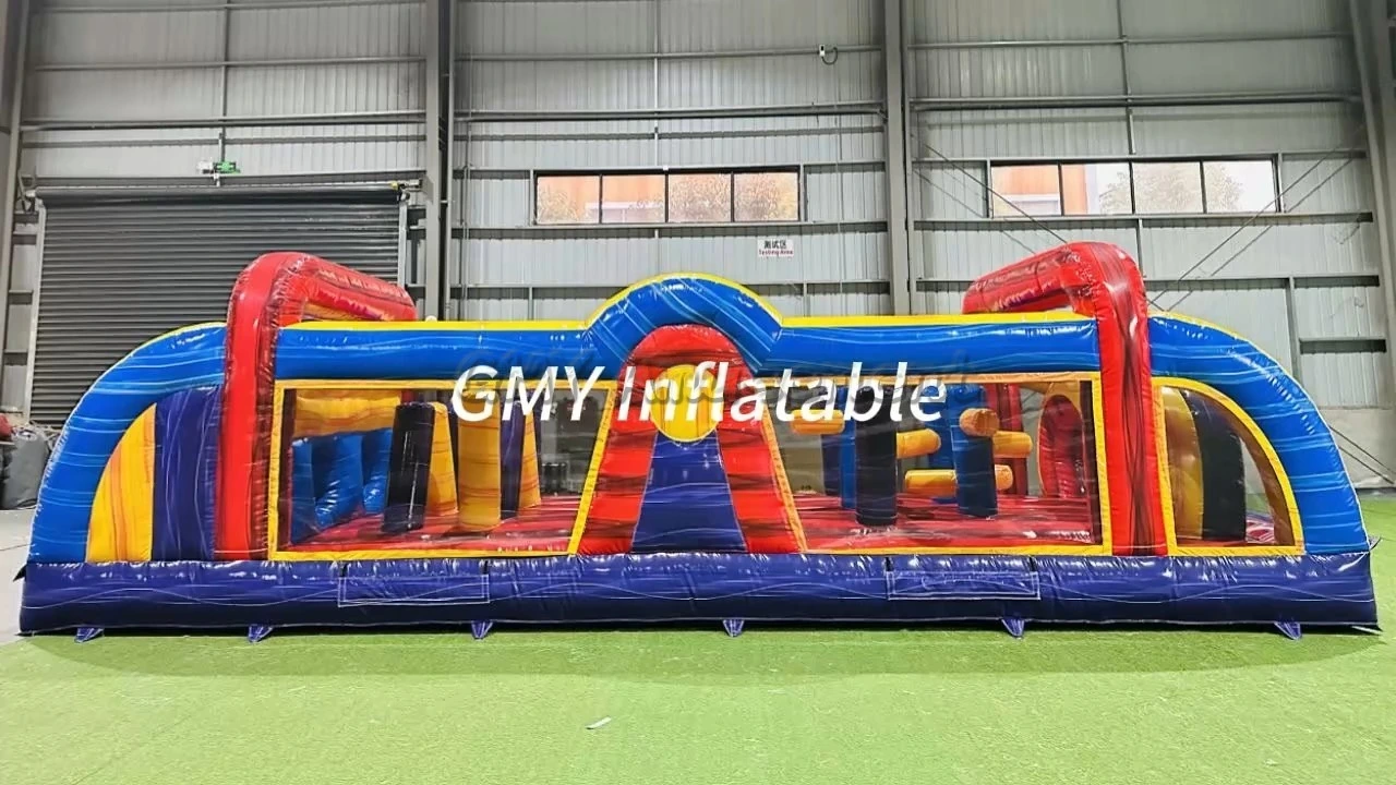 Aufblasbare Hüpfburg mit Hindernisparcours in Marmoroptik für Verleihunternehmen von GMY Inflatables 1