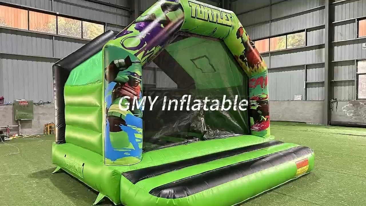 Location de châteaux gonflables pour fêtes - Château gonflable à thème dessin animé - GMY Inflatables 1