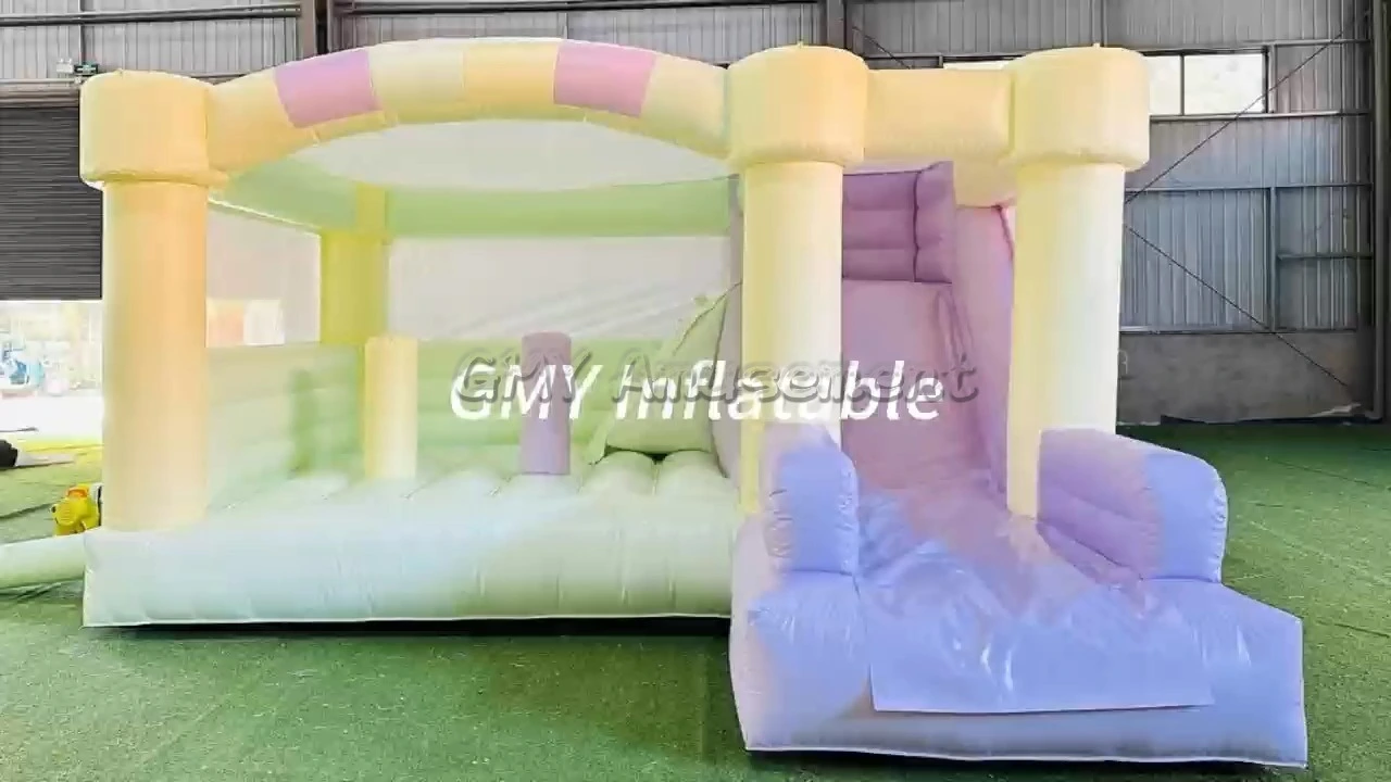 Château gonflable commercial d'extérieur aux couleurs pastel avec toboggan, GMY Inflatables 1
