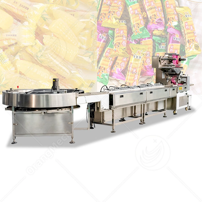 Máquina envasadora de dulces pequeña (500 bolsas/min) para galletas, chocolates y snacks. 1