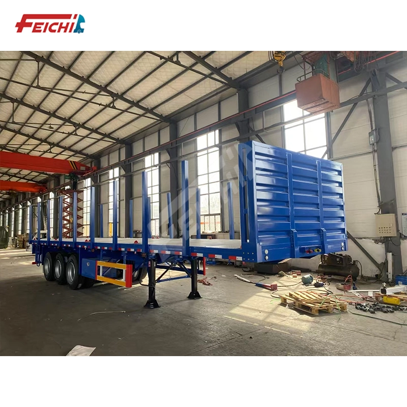 Полуприцеп-платформа FeiChi с колоннами, грузоподъемность 60 тонн, для перевозки лесов. 1
