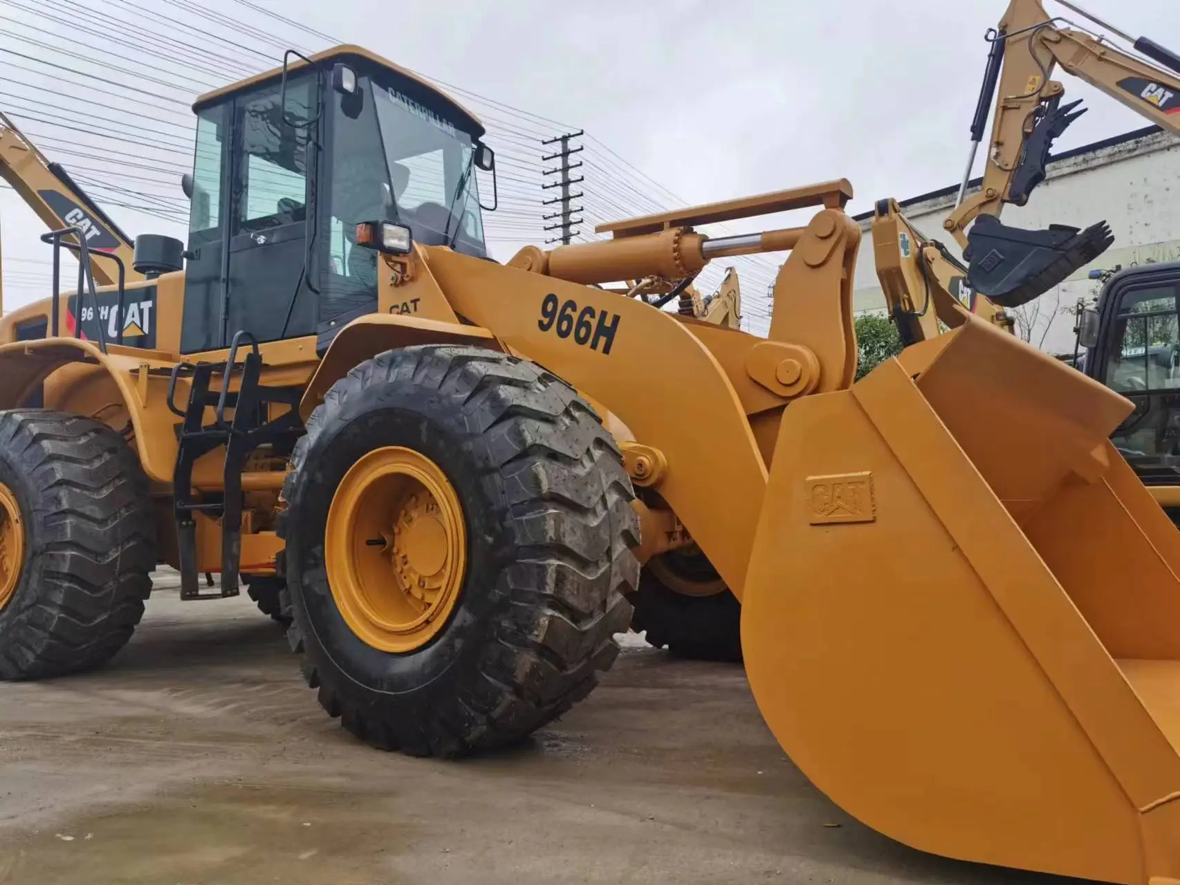 Б/у колесный погрузчик Caterpillar 966 фронтальный погрузчик Cat 966h подержанный дешевая цена на продажу 1