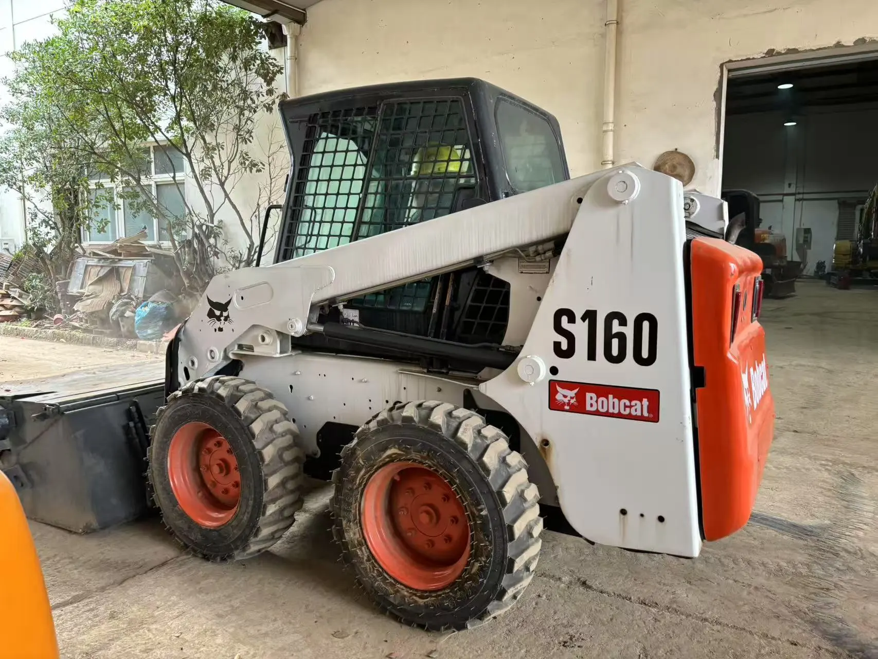 Secondhand Bobcat Mini Skid Steer Loader S160 with sweeping attachment 1