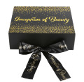 Foldable folding box with ribbon