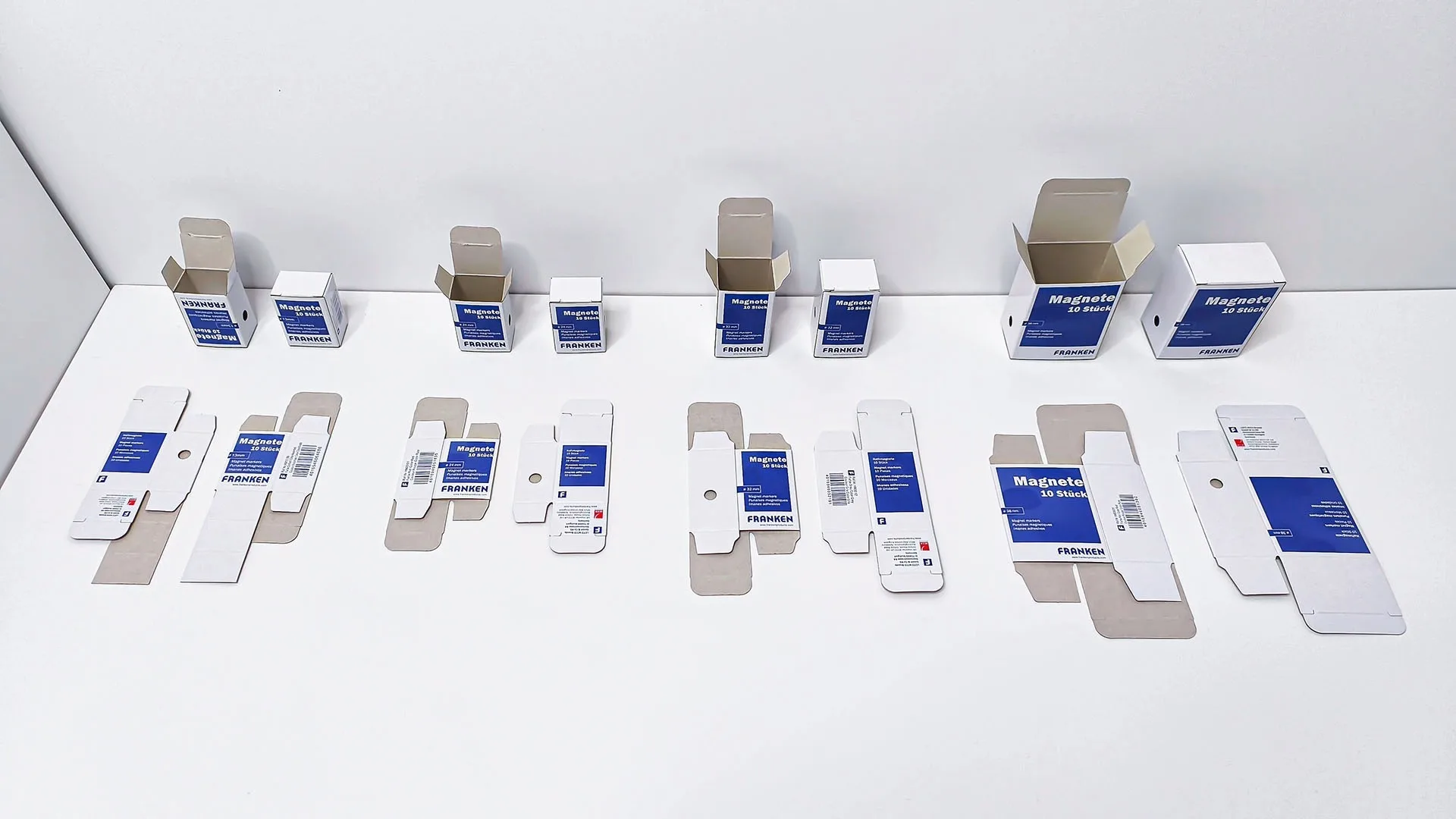 Xinghe Printing Custom Printing Series Packaging Box White On Grey Background Paper 1