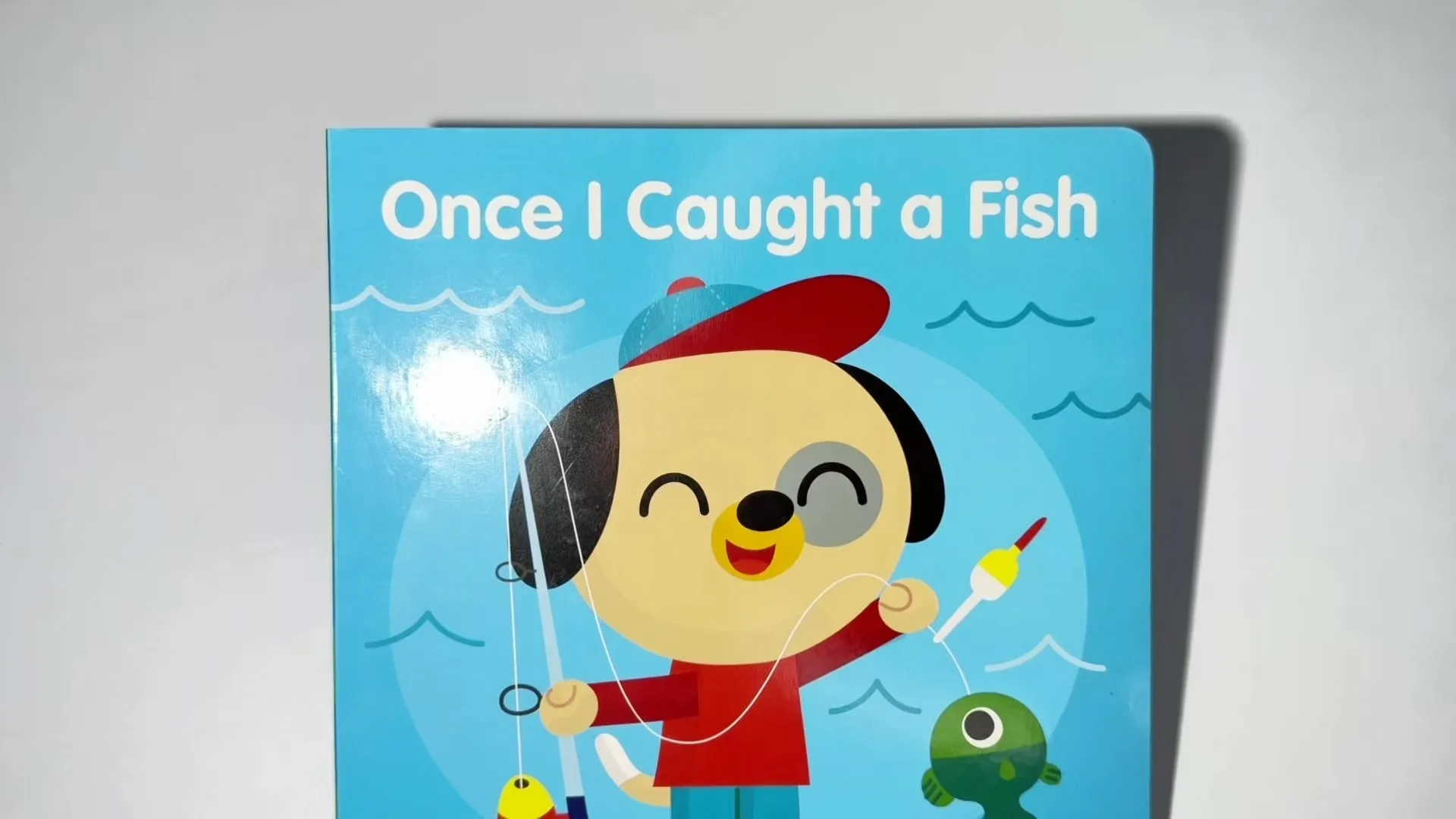 Catching Fish Story Children's Board Book Glossy Lamination Cover Grey Board Rounded Corners Perfect Binding for Baby Picture Book 1