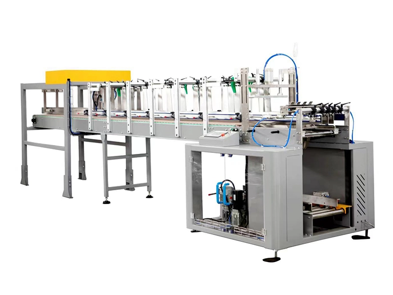 Drop-down case packer For plastic round bottles 1
