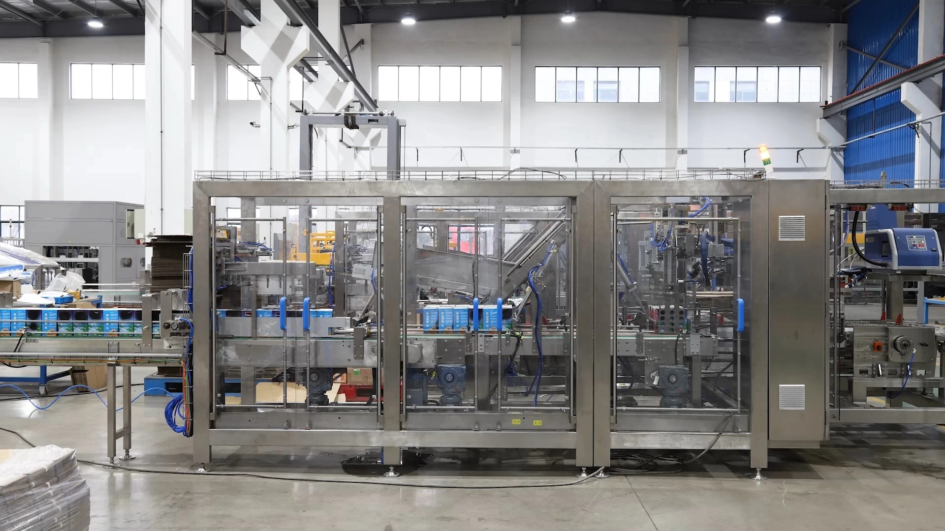 Automatic 1L Milk Side-Entry Wrap-Around Case Packer - WKD-CGB Series 1